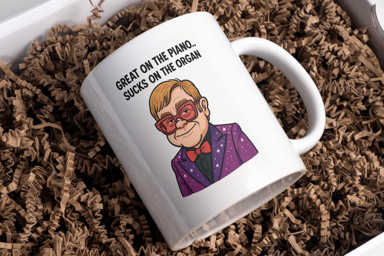 Elton Mug, Great on the Piano, sucks on the organ – Greeting Card